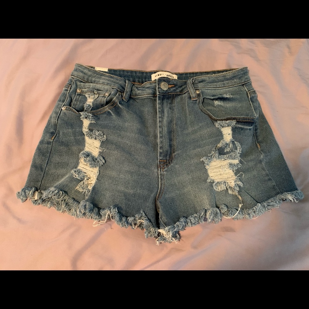 SOLD — Distressed jean shorts